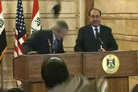 George Bush thrown shoe ducks Maliwi does not